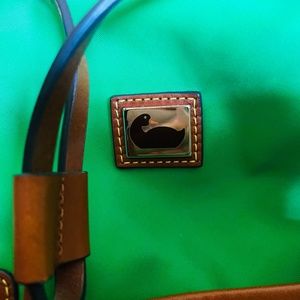 M/L Dooney and Bourke crossbody vinyl